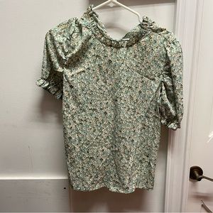 Green floral blouse